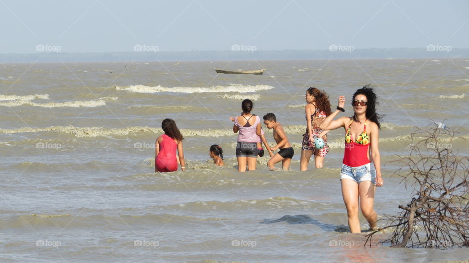 People enjoying in sea