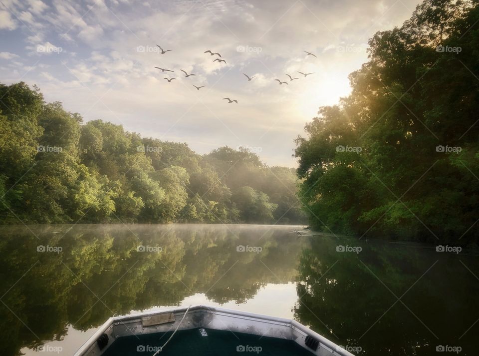 Peaceful foggy morning on the lake