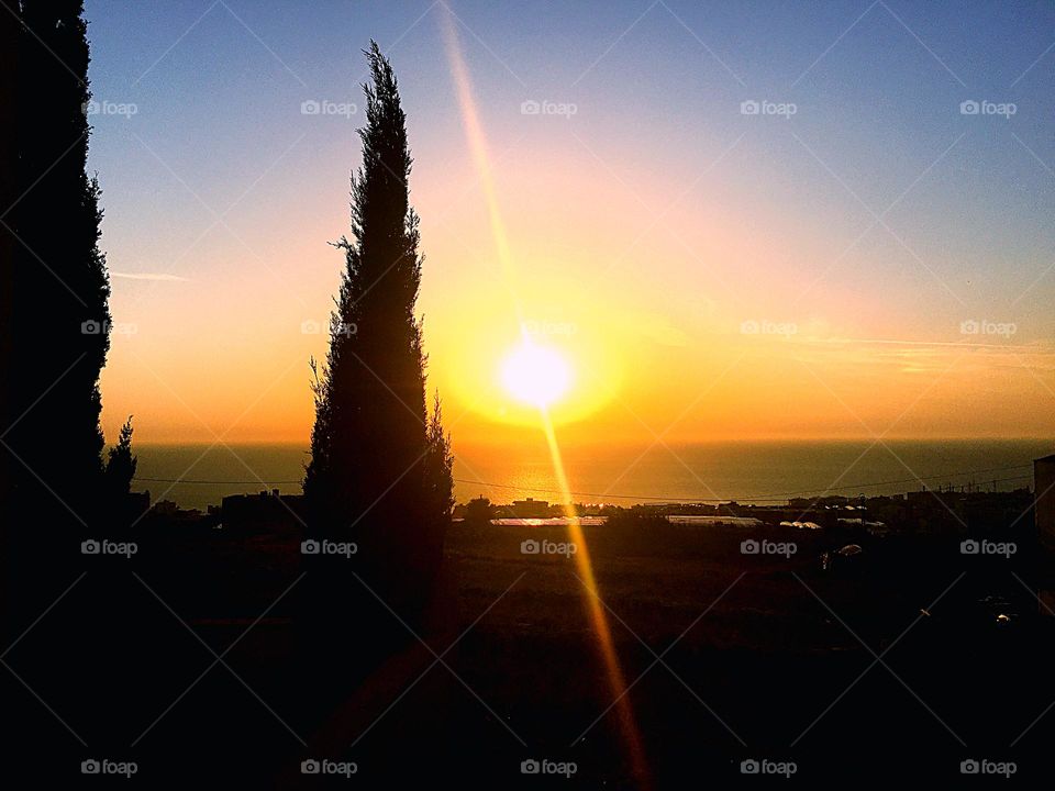 Dusk in the city and the sea