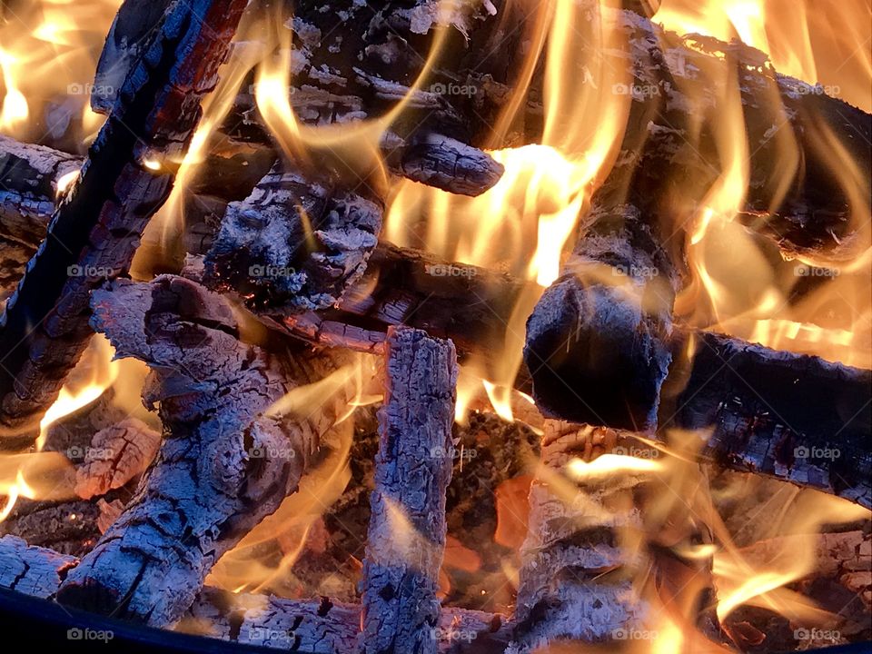 Coals burning at dusk