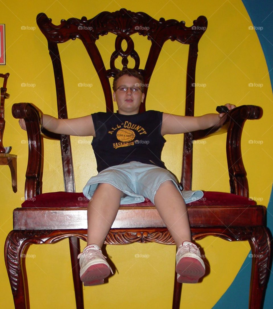 boy in large chair