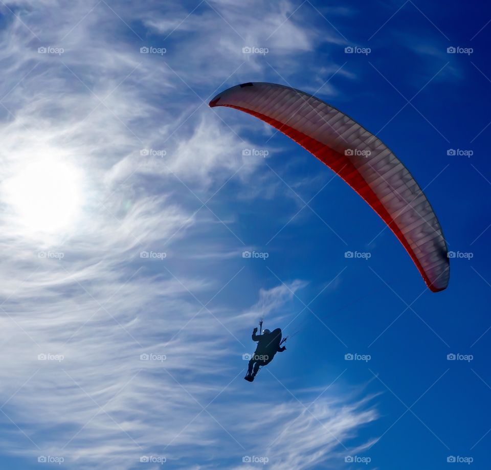 Paragliding into the sun - summer activities 