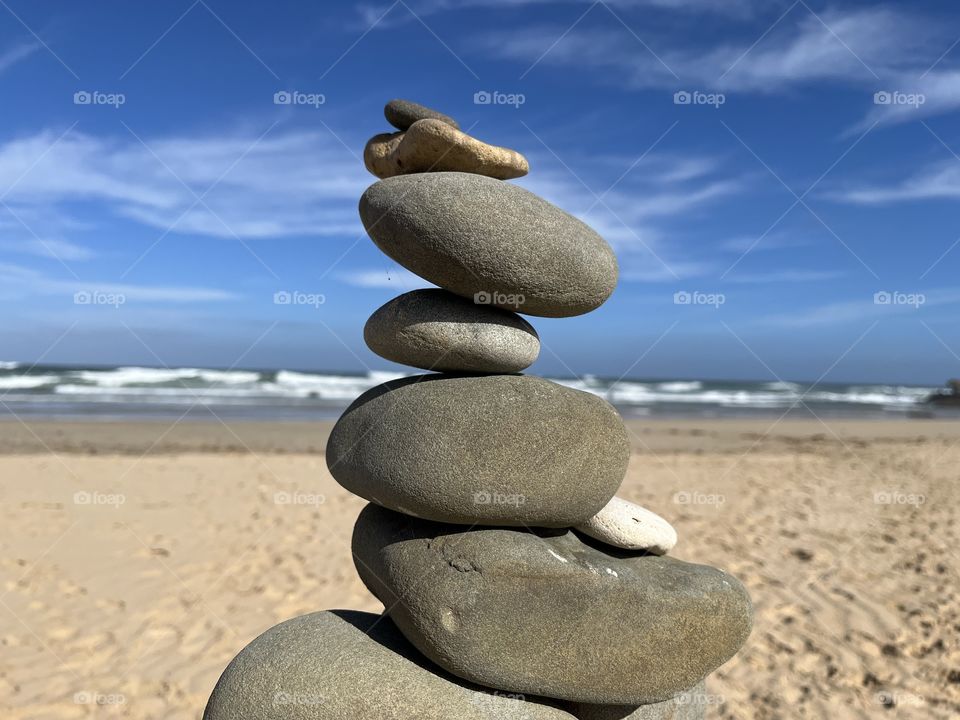 A tower of pebbles on beach