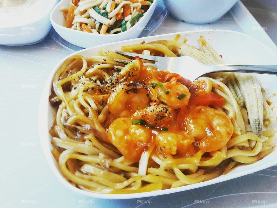 Close-up of shrimp with noodles