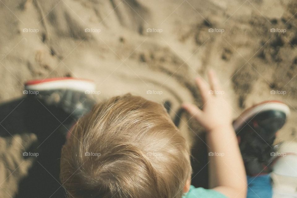 Playing in the sand.