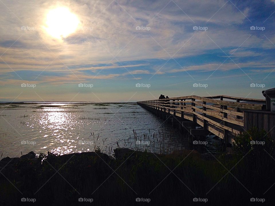 The hour before sunset. Boardwalk in the golden hour - golden hour mission