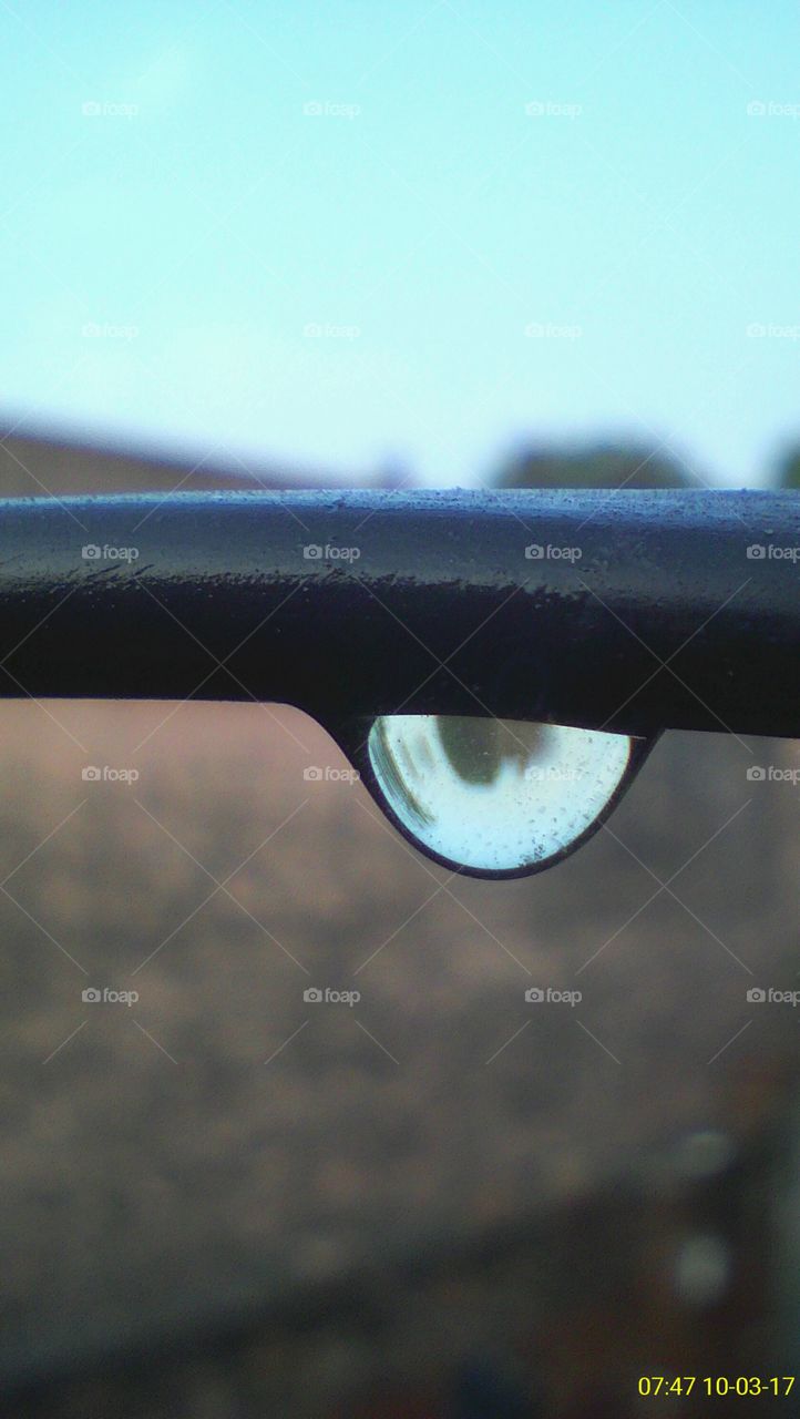 water drop, a water drop hanging from an electrical wire