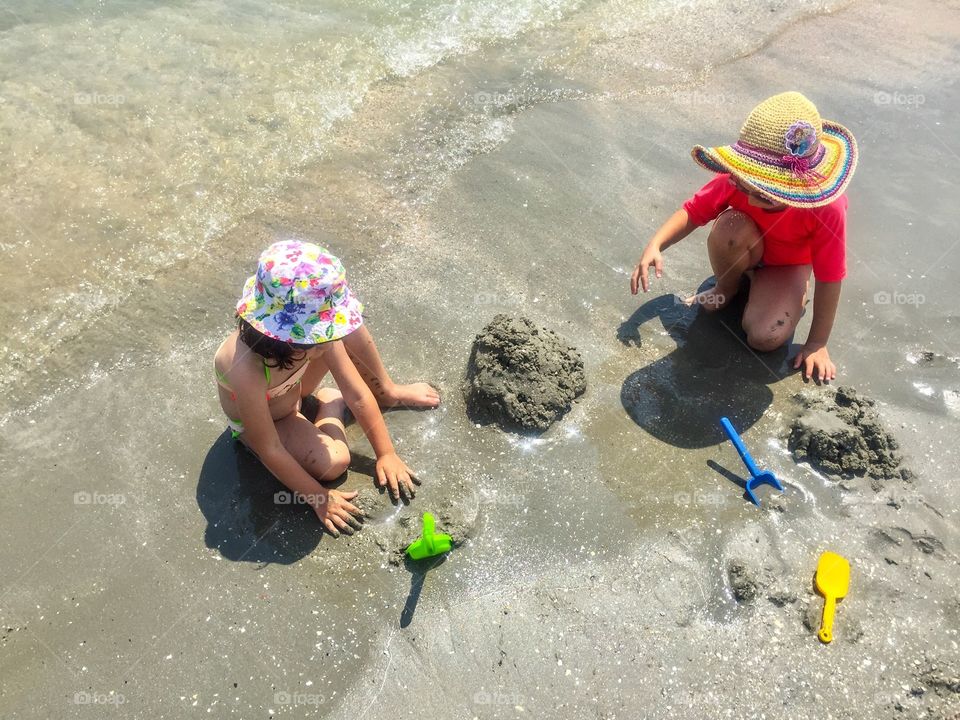 Kids playing in the sand