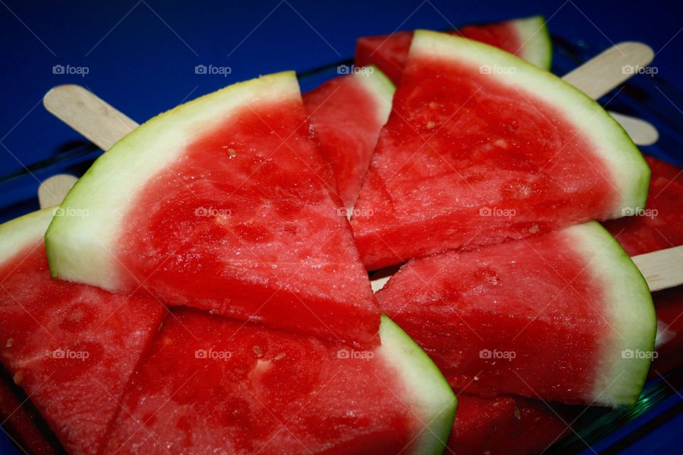 Watermelon Pops. Watermelon wedges on a stick. 