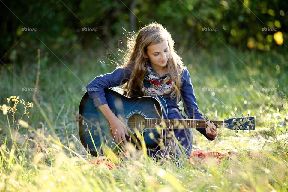 Girl playing guitar