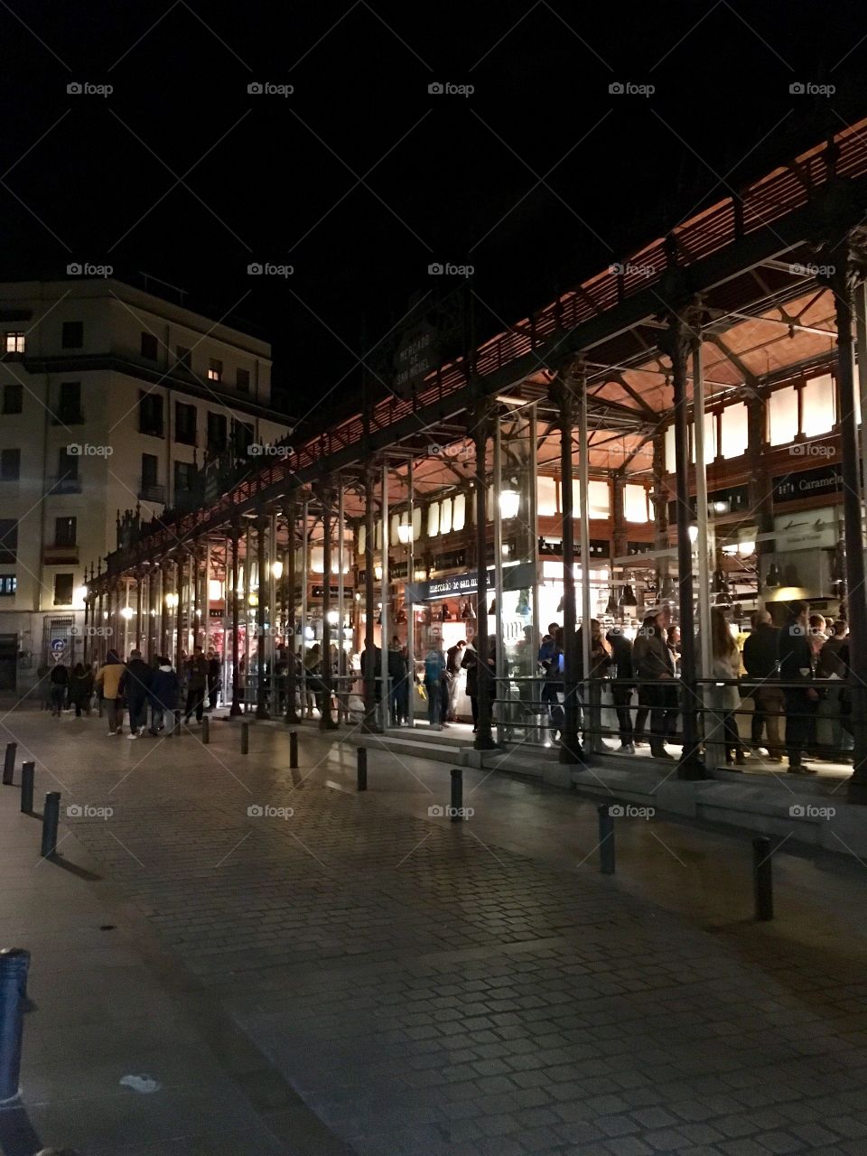 An old central market now converted into a hipster seen and be-seen dining spot. Full of modern restaurants contrasted by ancient architecture.