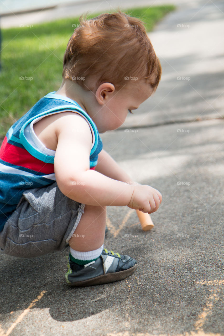 Playing with sidewalk chalk