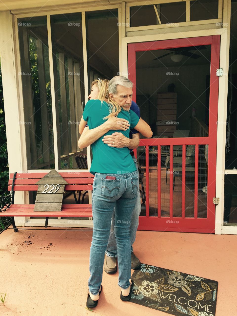 Senior father hugging his daughter