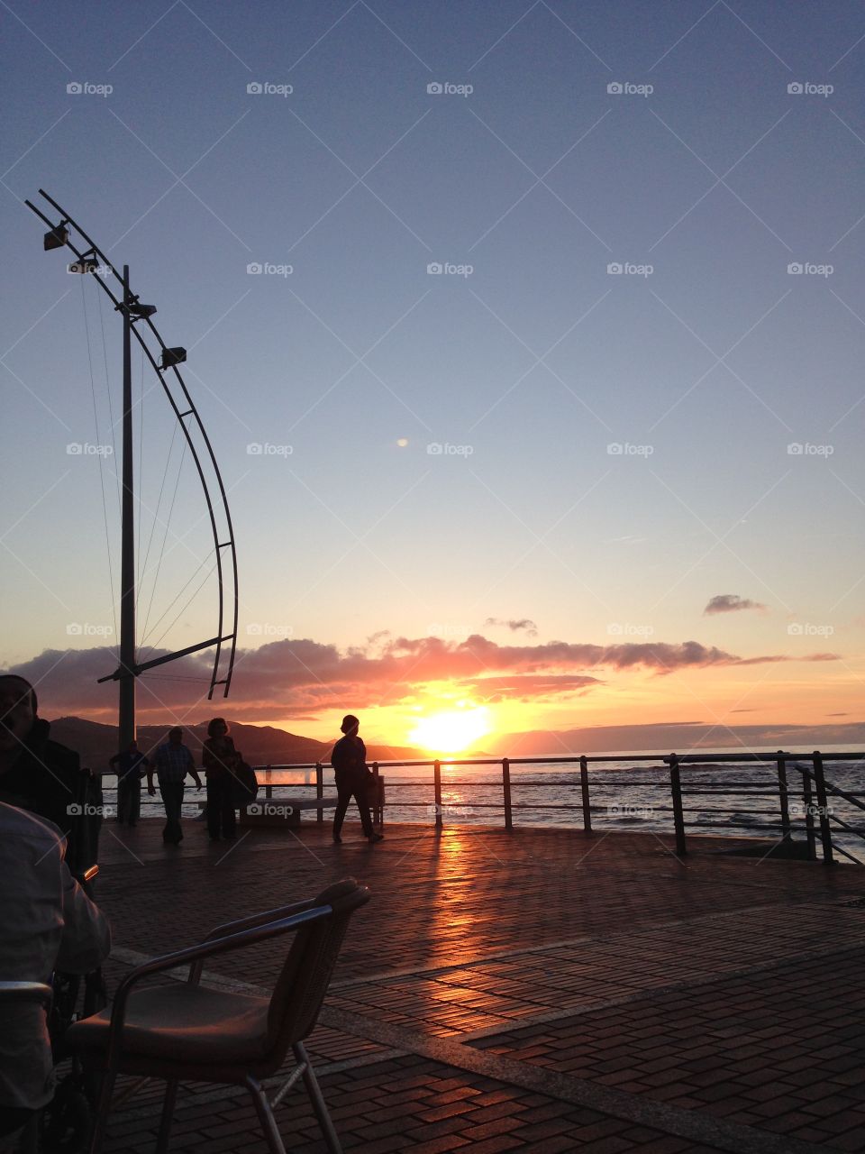 Romantic and beautiful sunset at the beach avenue