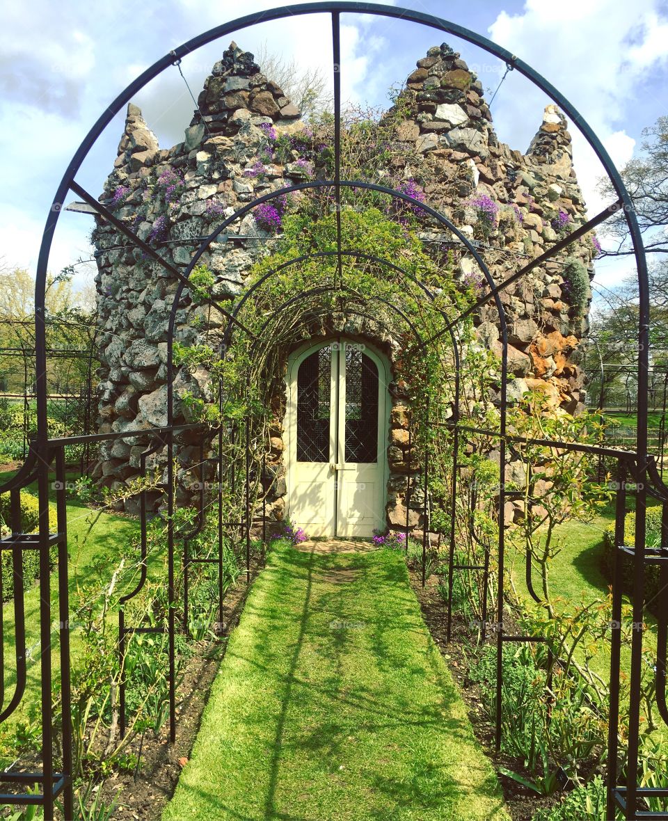 Archway door in house gardens