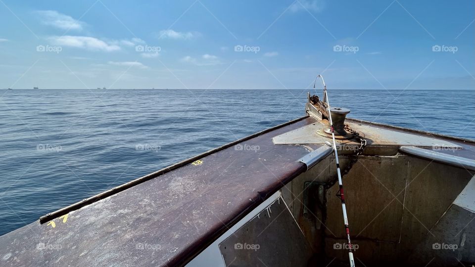 View from the bow of a fishing boat in the California Pacific Ocean. 