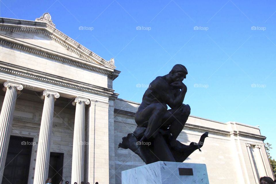 Statue in front of The Cleveland Museum of Art, on a warm, clear sunny day in Cleveland, Ohio, United States 