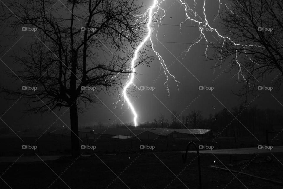 Lightning  strike. me and my fiancé  decided to brave the storm to get this picture. I got my equipment set up and snapped away.  