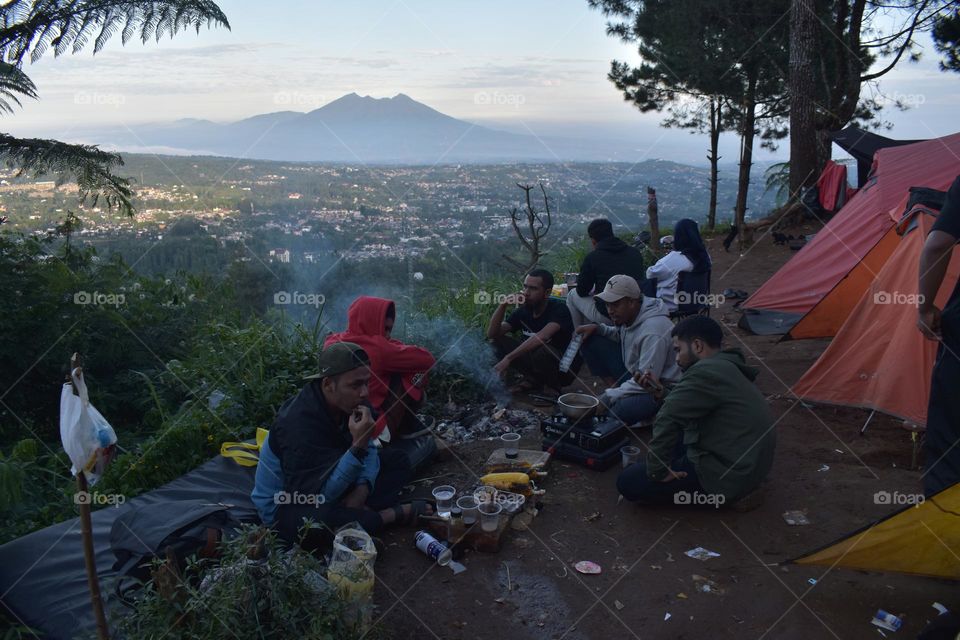 Camping at Puncak Bogor and enjoying the view of Bogor city and Mount Salak in the distance