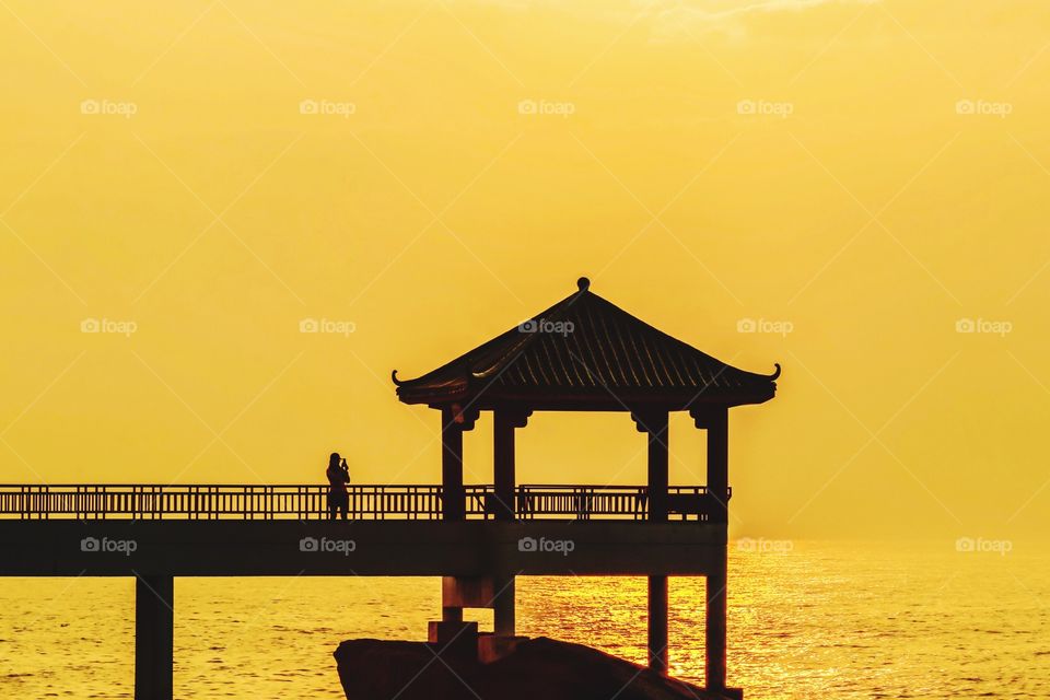 Selfie alone during Sunrise at a Gazebo of Long Chao Kok Coastal Trail, Macau. A beautiful moments with the Natures