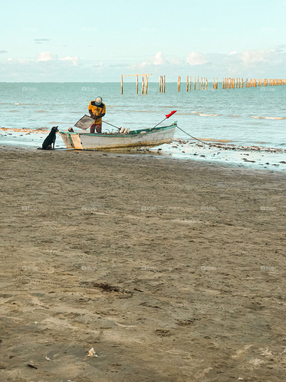 fisherman organizing his fishing gear in southern Bahia