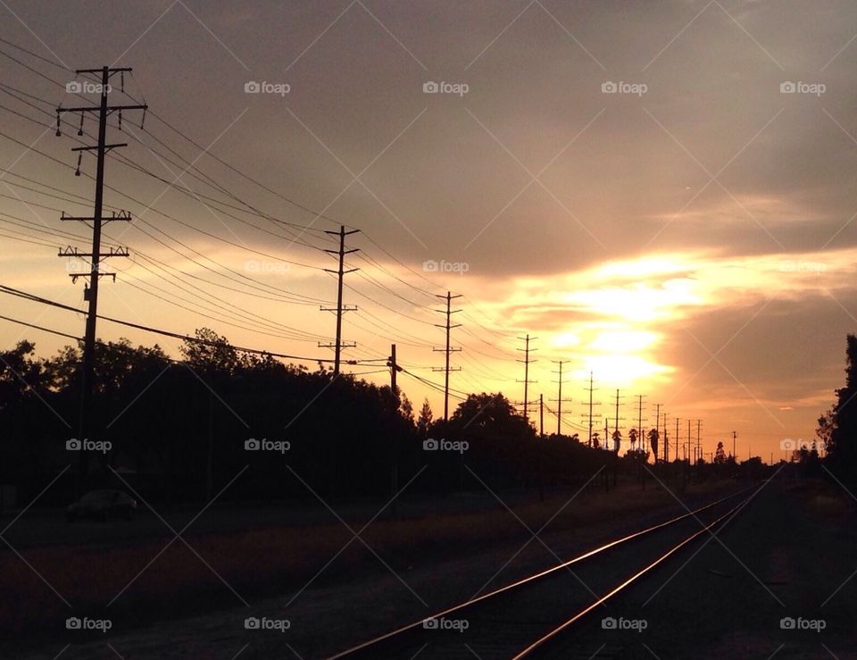 Tracks off into the Sunset. Taken on my way home from work 