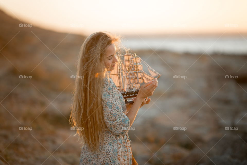 Portrait of beautiful young woman at outdoor