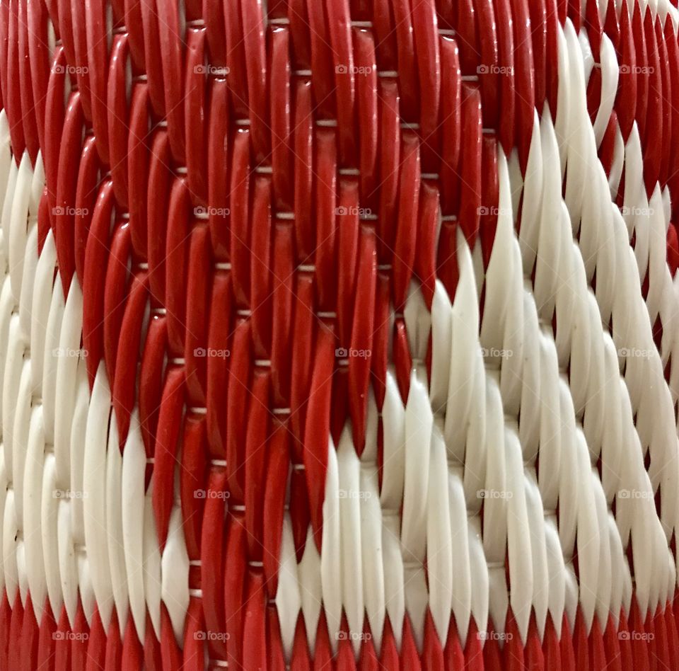 Red and white smooth plastic mat