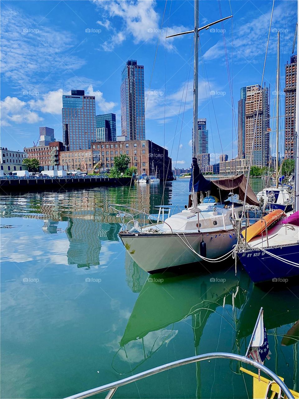 This is beautiful „Newtown Creek“ in LIC, Queens. Many boats are tied to the shore here and the best place to appreciate them from is aboard one of them such as the „Salvation“, our „1969 Luhrs“ cabin cruiser. 2023. Hypnotic Productions