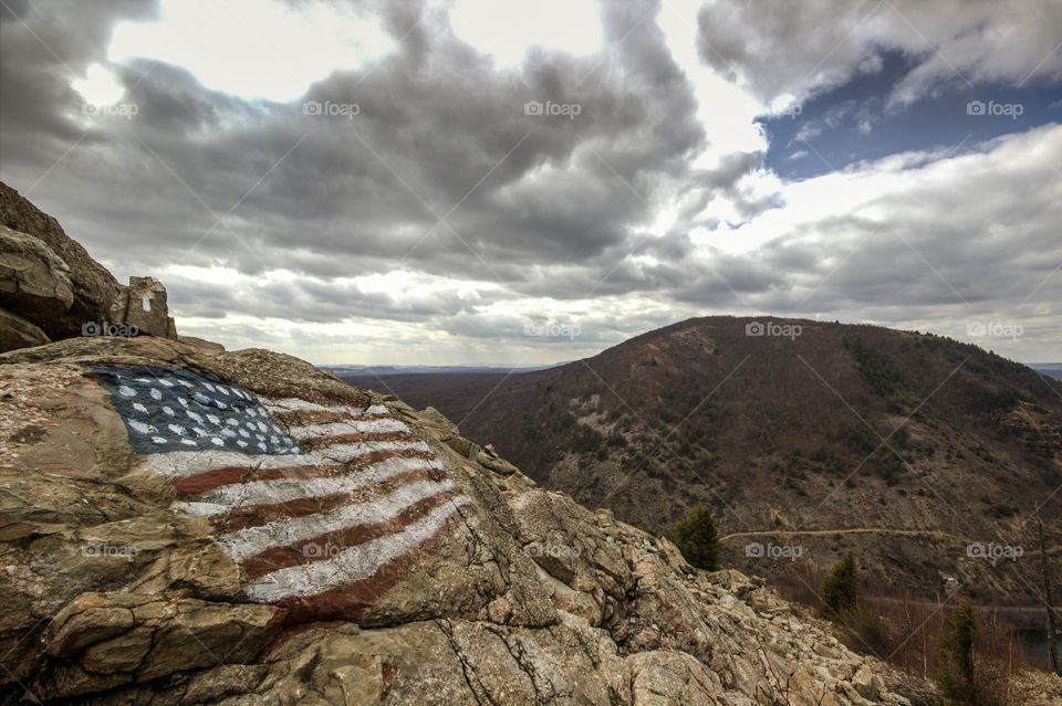 American flag on rock