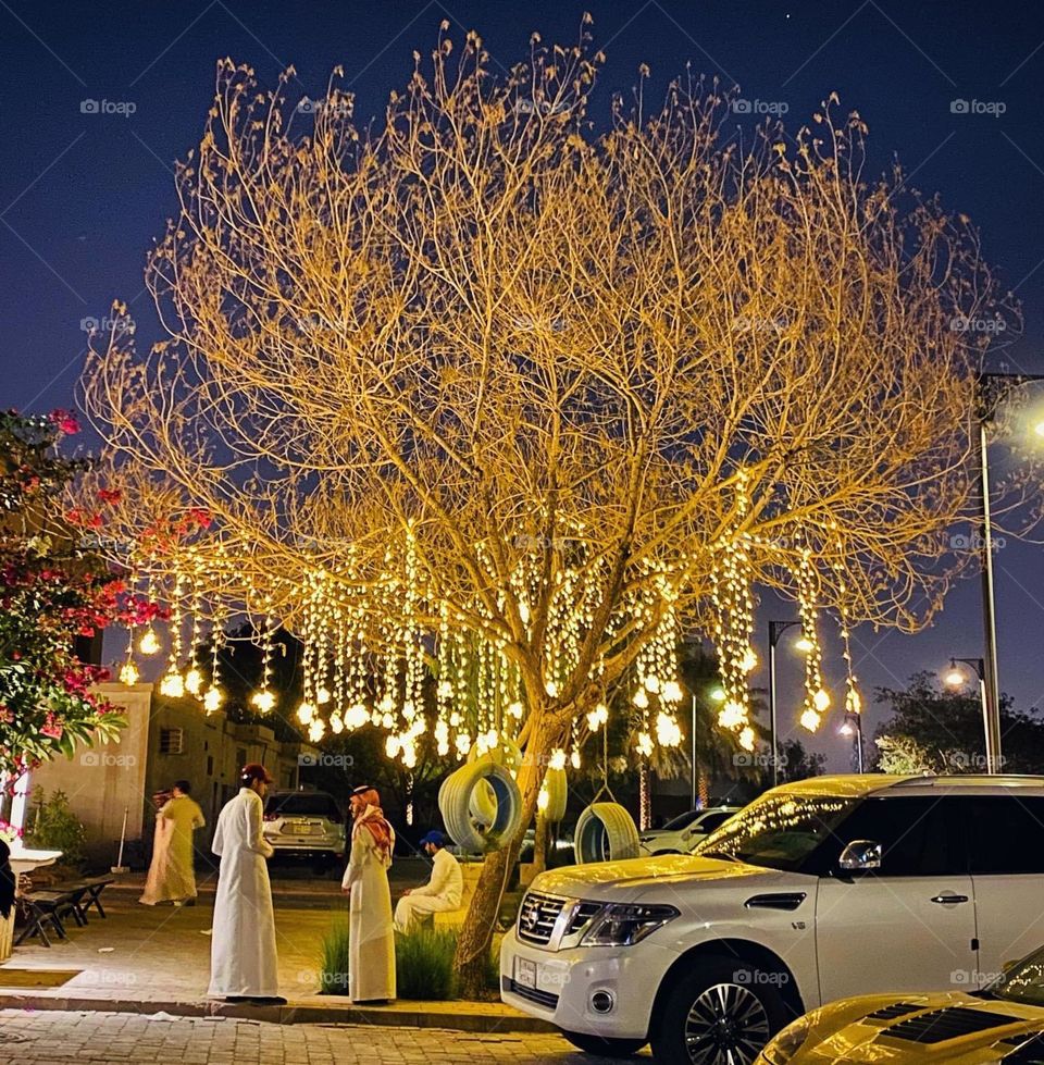 Beautiful view at night of the fairy lights on a tree decorated beautifully 
