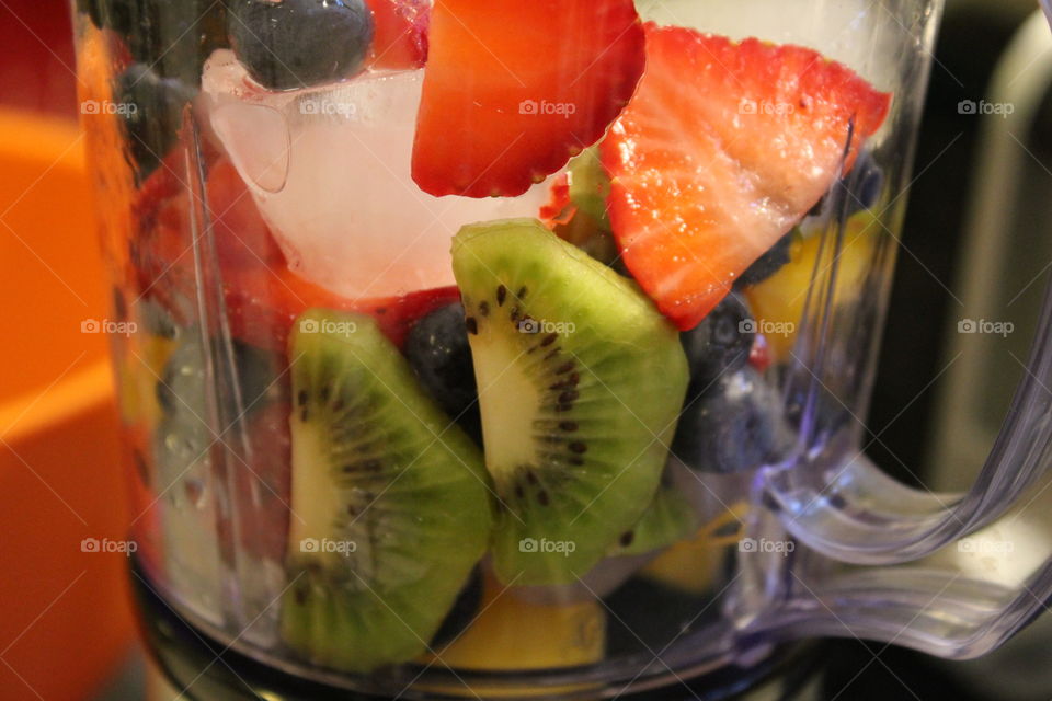 making a berry smoothie