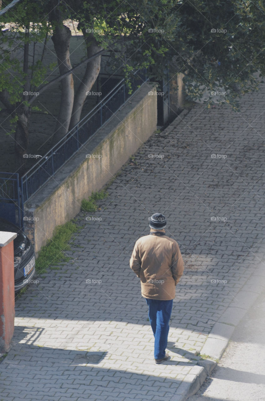 Old man outside in quarantine.