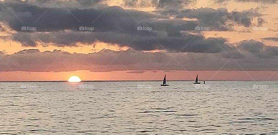 sunset n sailboats