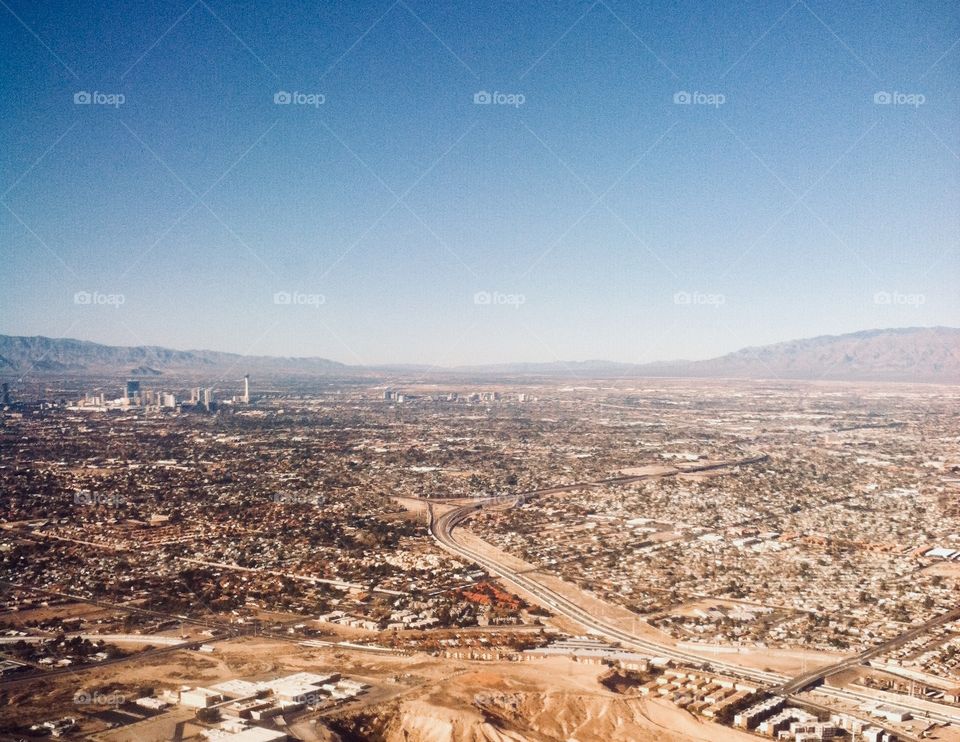 Viva Las Vegas! It may not be lit up with the night life, but this birds-eye view showing the desert in the daylight shows how large and vast the city is.