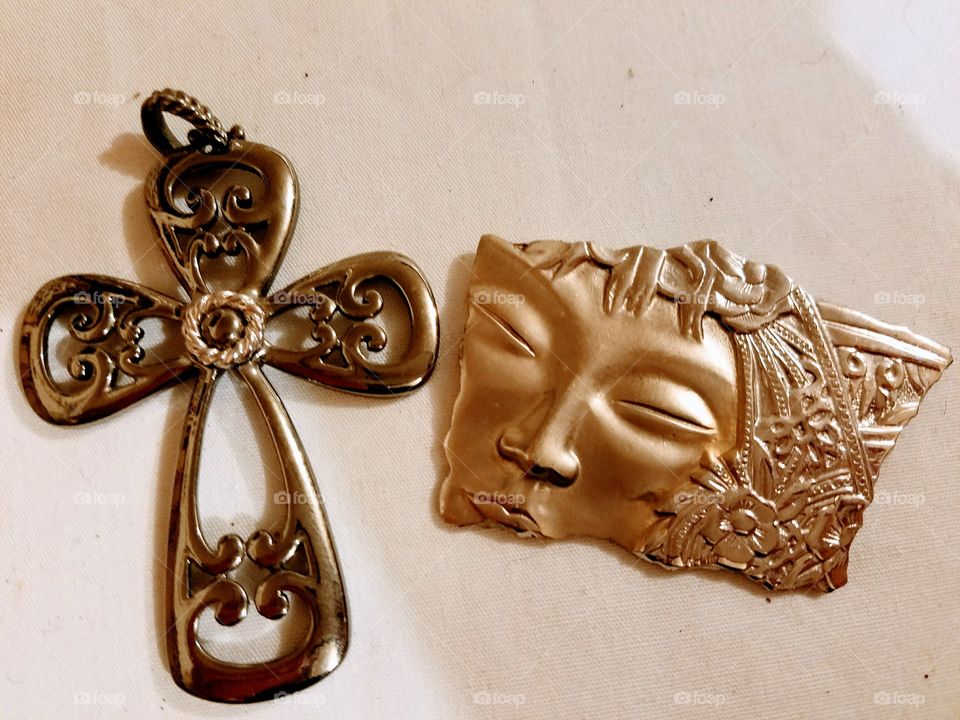 cross and lady pin