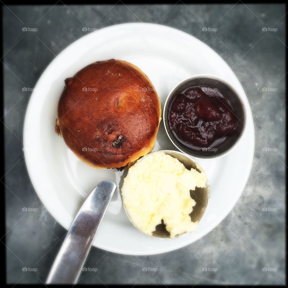 Scone. Scone with clotted cream and strawberries compote 