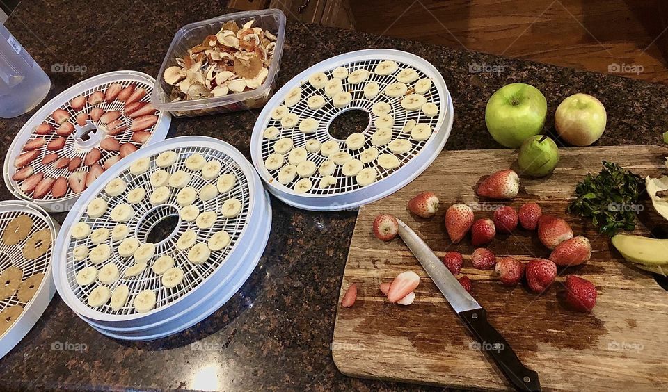 Preparing fruit for the dehydrator 