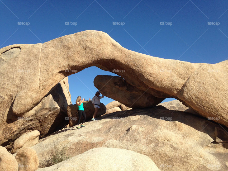 Climbing on Rocks in Joshua Tree National Park 