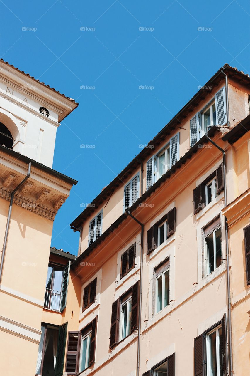 Architecture in Rome against a bright blue sky