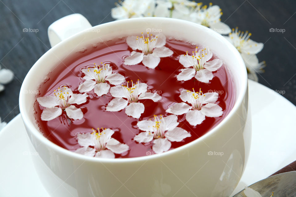 Flower in tea cup