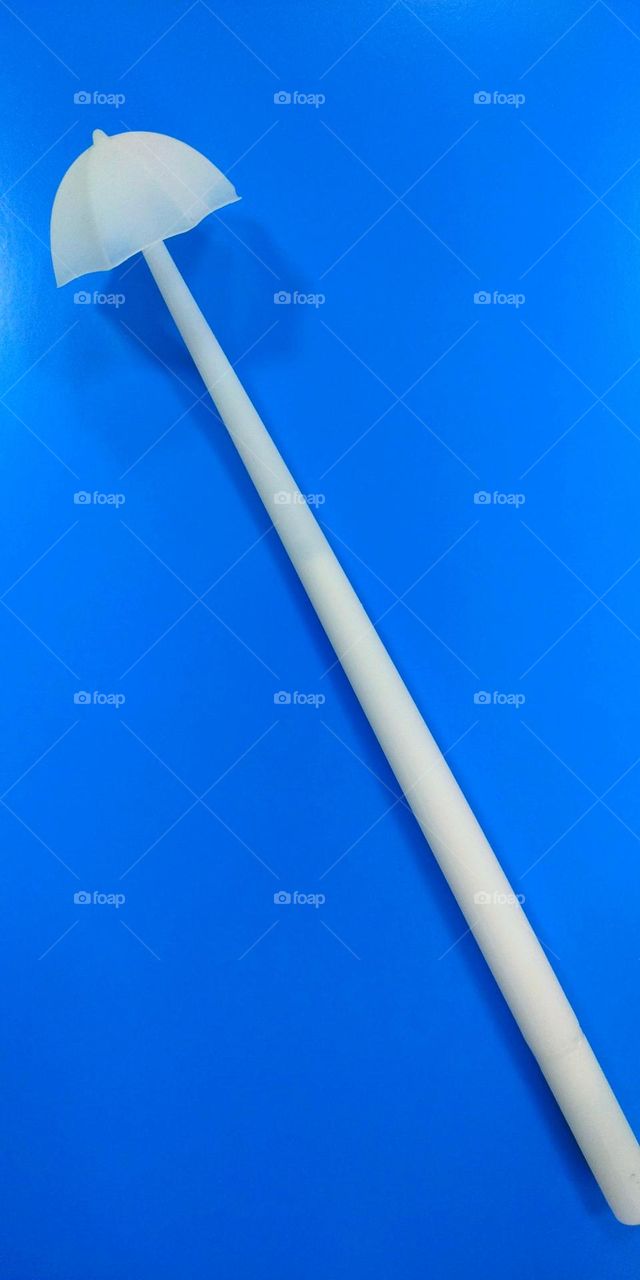 A white object on a blue background