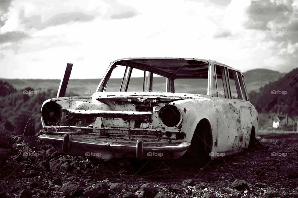Old car on road 666