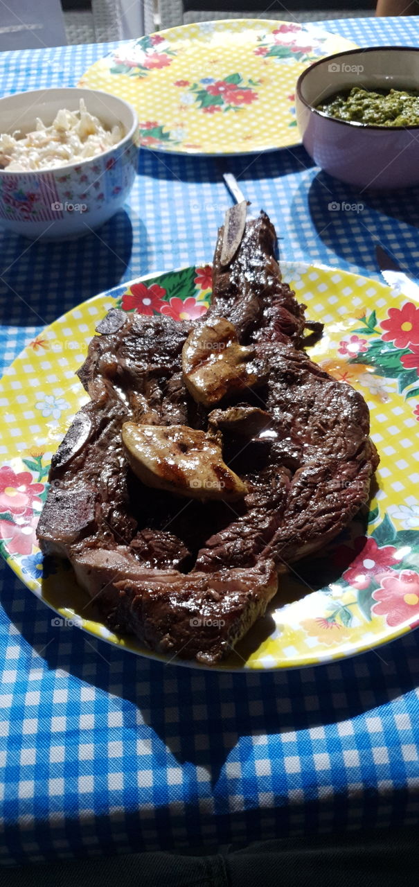 An entrecote steak duet and goose breast medallions