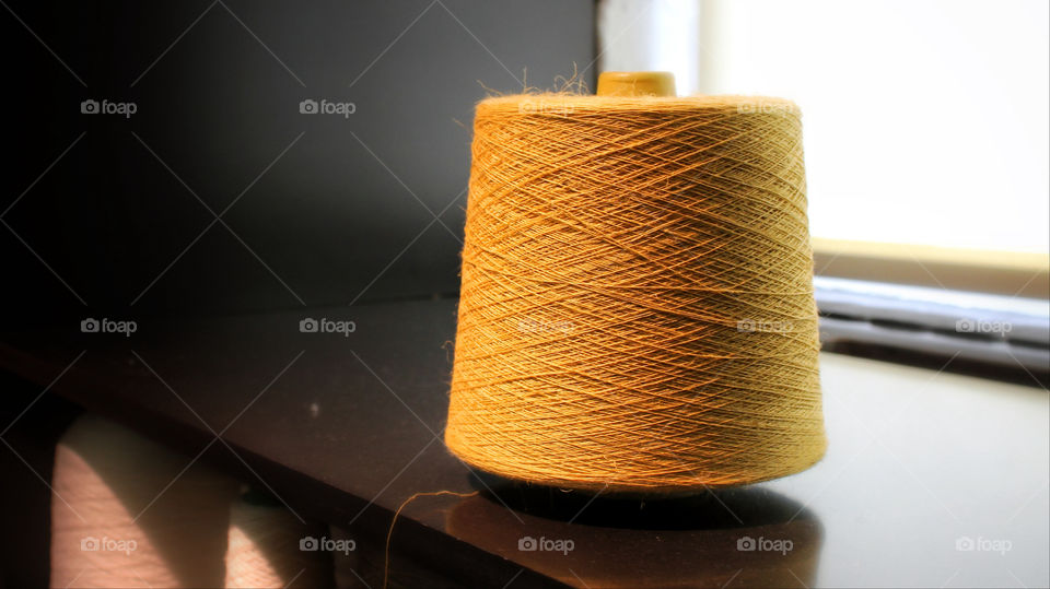 yellow textile yarn string by twilite