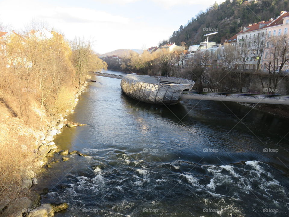 Graz Austria modern bridge across river Mura
