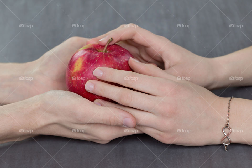 apple in hands