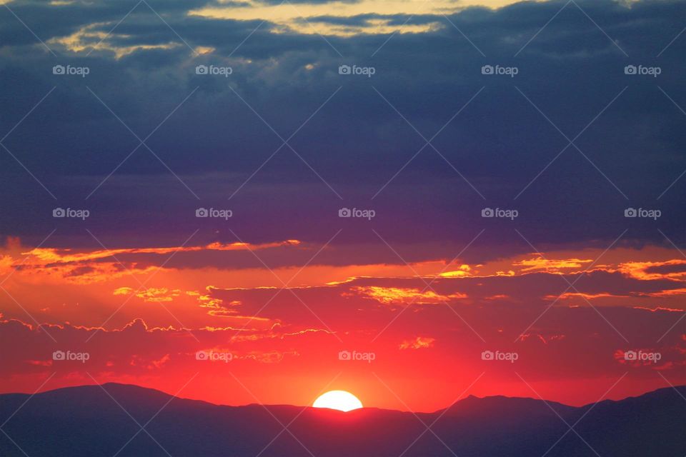 Sunset goes with cloud.