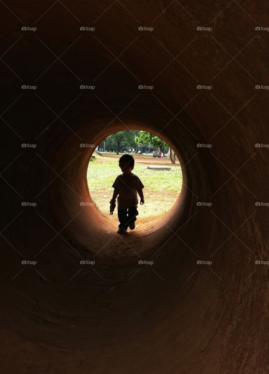 I shot my little son through this tunnel that I found in a Park.