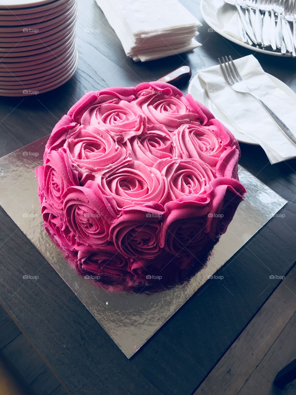 Stunning pink rose swirl party cake 